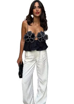 Damski top crop typu cami z ramiączkami spaghetti i aplikacjami z przodu